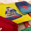 Gli ombrelloni rotti diventano regali per i bimbi di San Teodoro