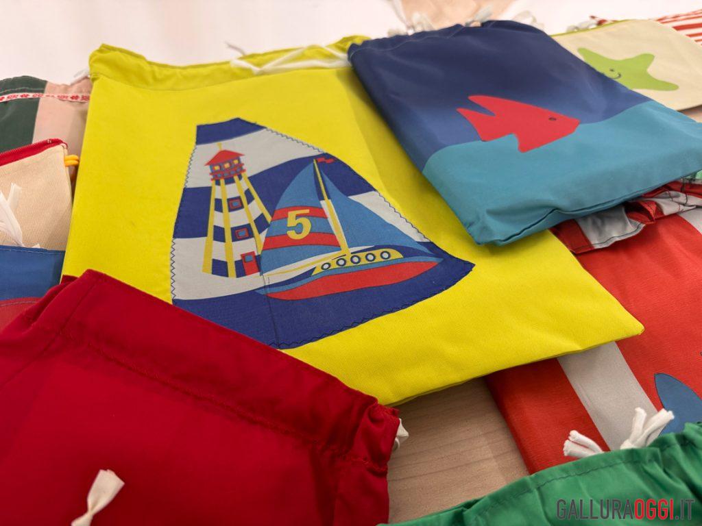 Gli ombrelloni rotti diventano regali per i bimbi di San Teodoro