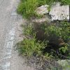 Grossa buca non segnalata sulla strada per Arzachena, rischio incidenti